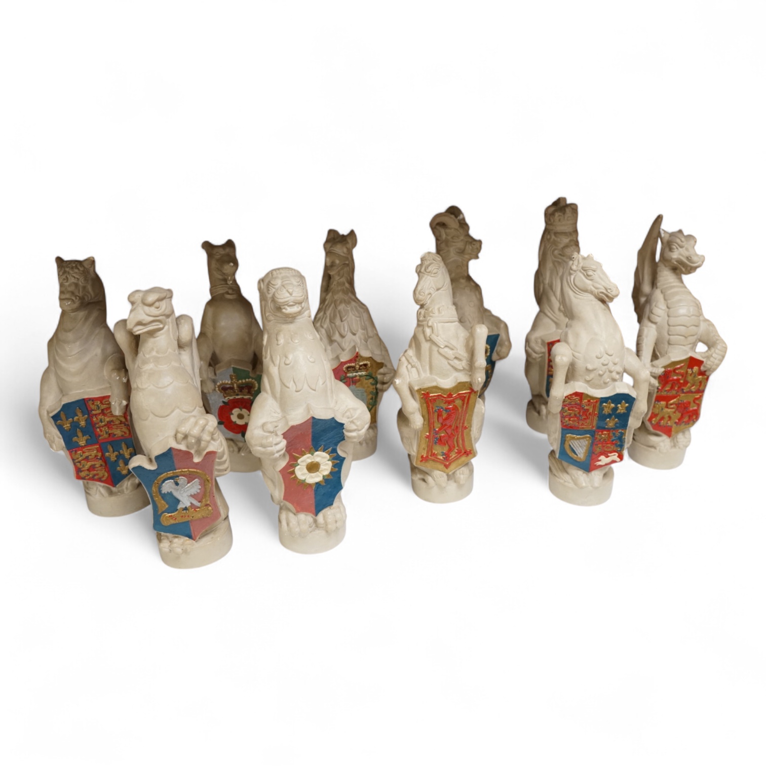 James Woodford, ten painted plaster figures of the Queen's Beasts, inscribed and dated 1953, 26cm high